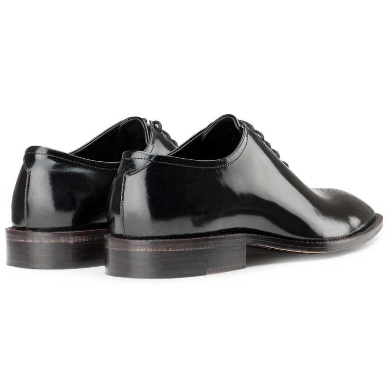 Medallion Wholecut Oxfords in Black