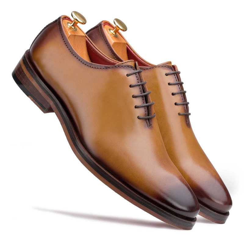 Wholecut Pinch-Toe Oxfords in Tan