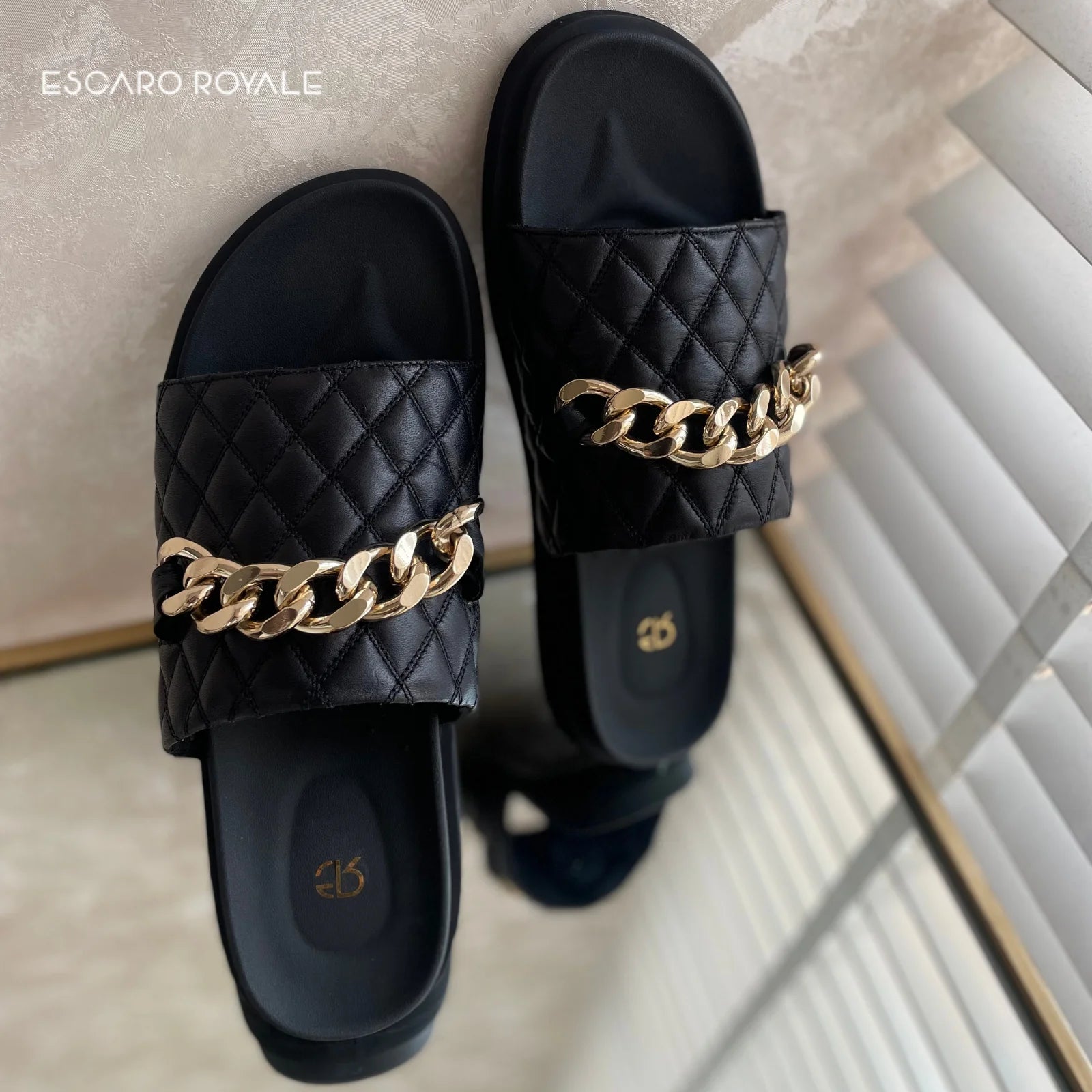 The Raffles Quilted Sliders In Black