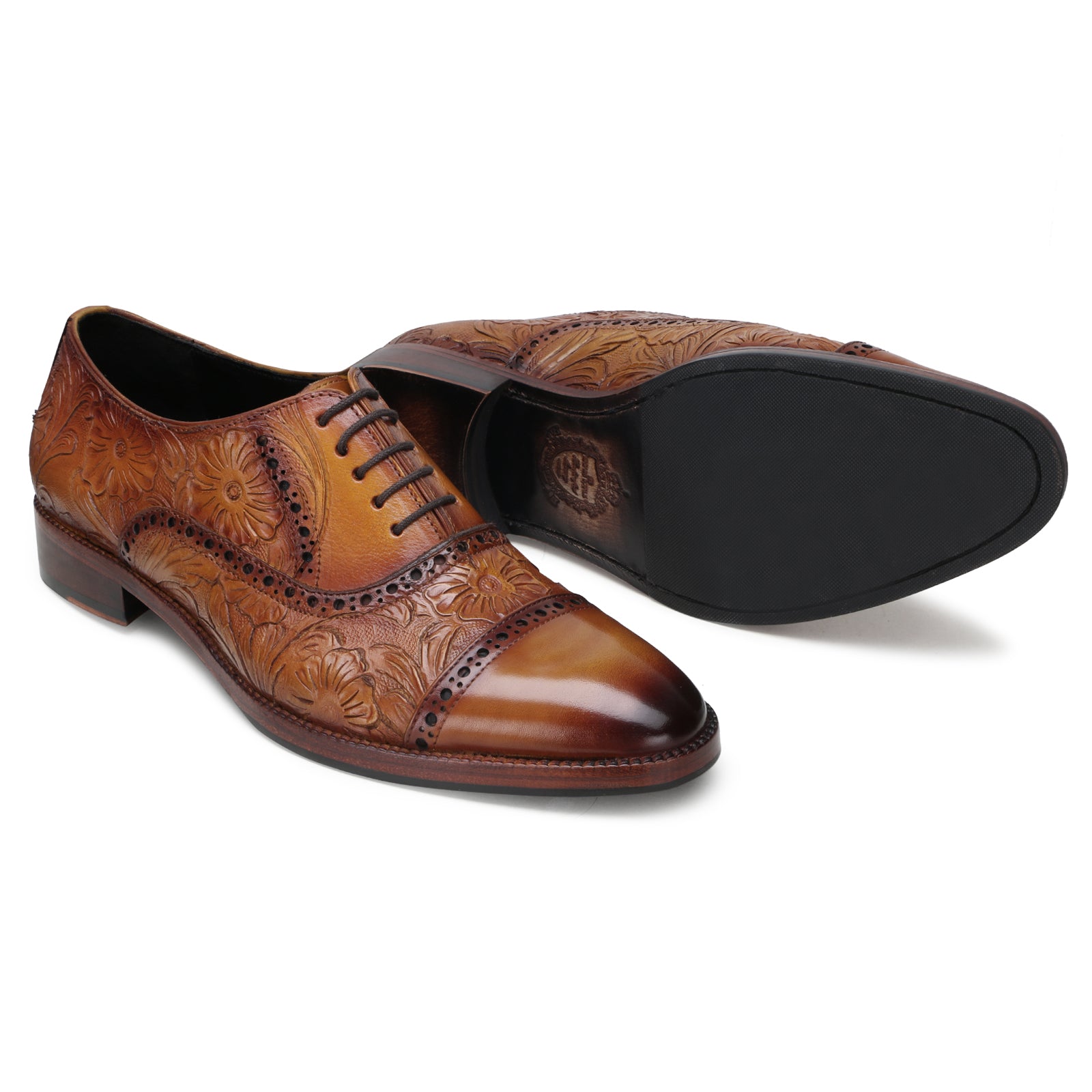 Handtooled florentine cap-toe oxford in cognac