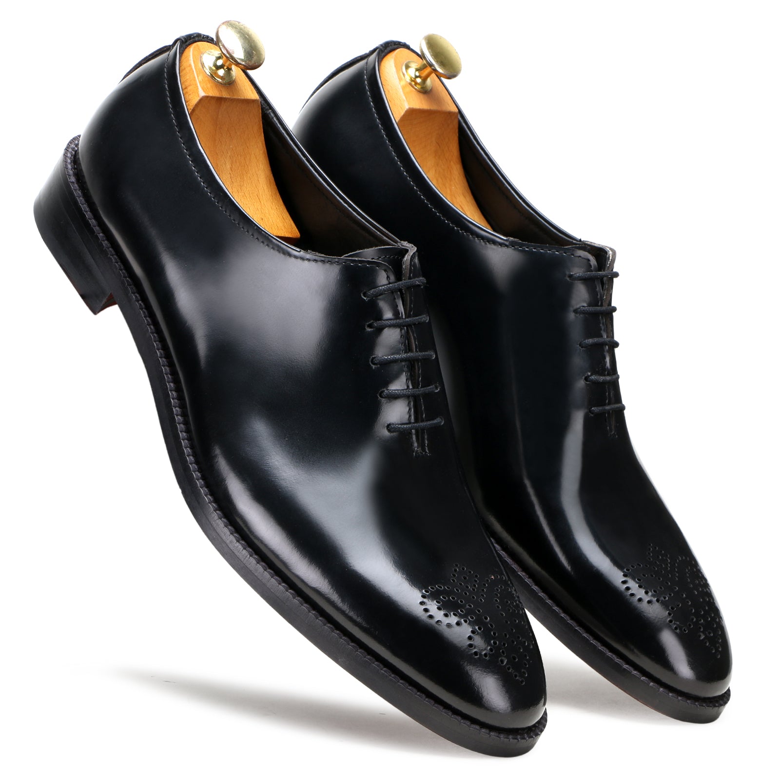 Medallion Wholecut Oxfords in Black
